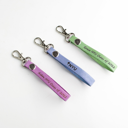 three leather keychains to commemorate that special graduate