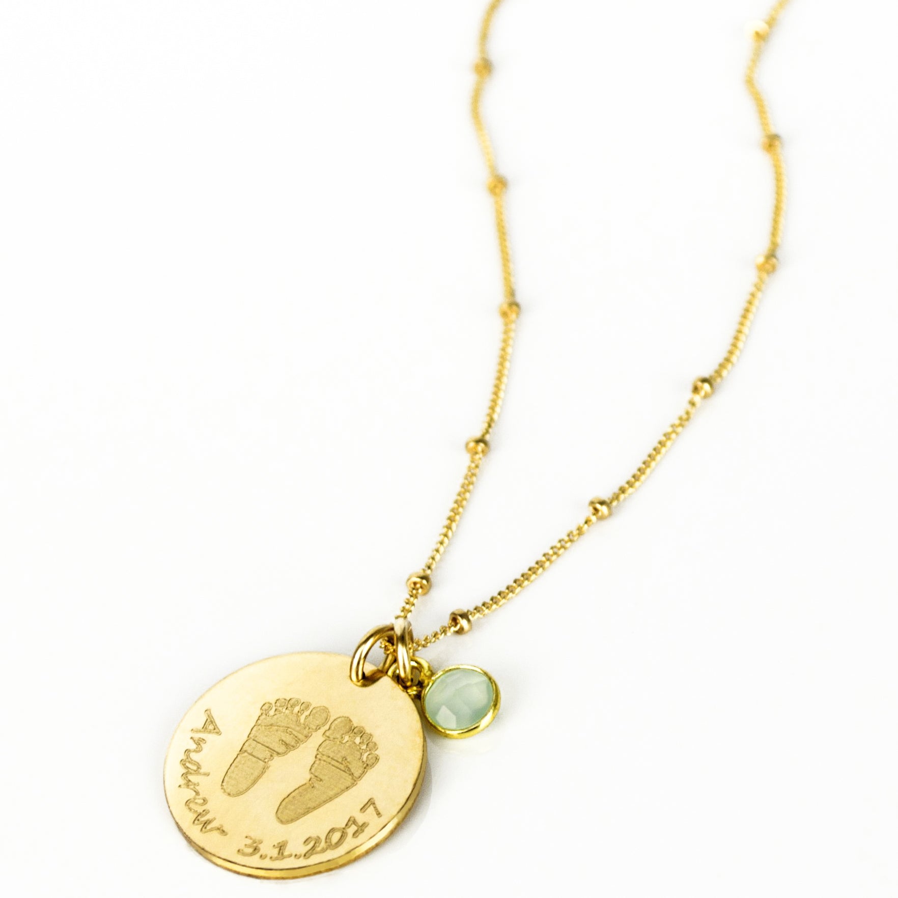 Gold filled necklace engraved with baby's footprints, name and date and add an optional birthstone charm to complete this perfect gift for mom on Mother's Day, for a push present, or birthday gift.