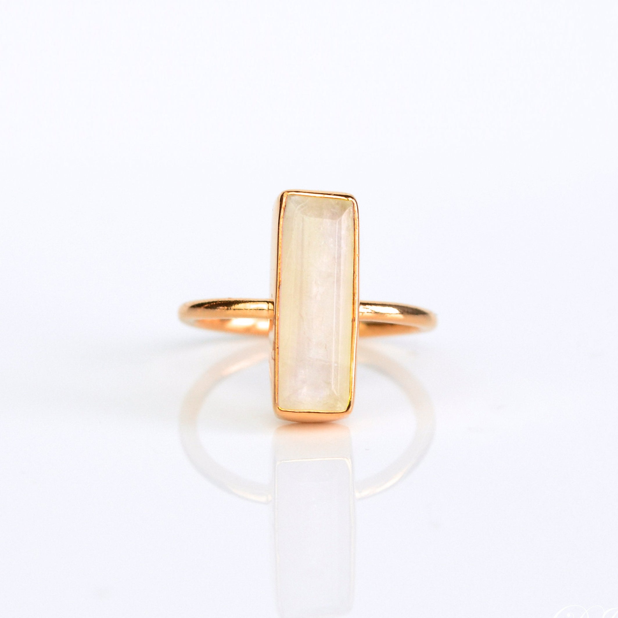Moonstone gemstone ring, June birthstone accessory, natural Moonstone with feldspar, shimmering color display, thin vertical design, Adira Series ring, bezel-set Moonstone jewelry, elegant Moonstone bar ring, unique June ring, fashion-forward Moonstone