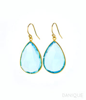 Large teardrop style earrings in blue topaz, december birthstone. blue topaz gemstone, december gemstone. Large dangle earrings.