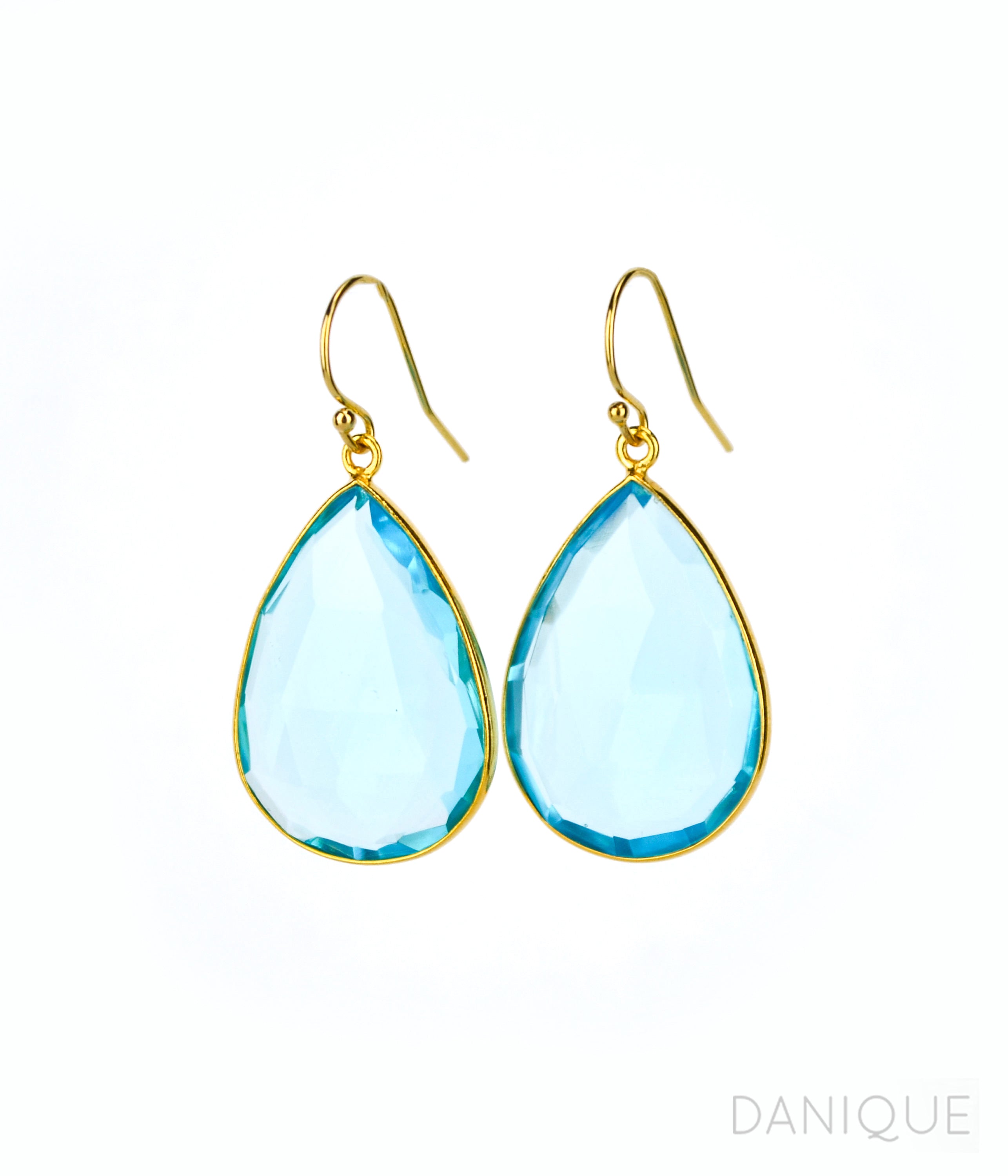 Large teardrop style earrings in blue topaz, december birthstone. blue topaz gemstone, december gemstone. Large dangle earrings.