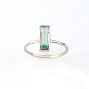 Sterling silver tiny blue topaz rectangle ring rectangle birthstone rectangle gemstone on white background light blue ring blue ring bar ring