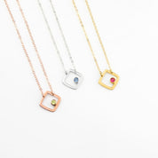 gold plated open square minimalist necklace with ruby birthstone, july birthstone july gemstone. birthstone jewelry. minimalist jewelry. sterling silver open square with iolite birthstone, rolse gold plated open square necklace with peridot birthstone. august birthstone.