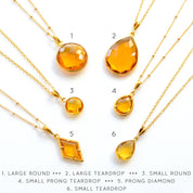 Shop our citrine necklace collection available in large, medium and small teardrops, prong set teardrop, prong set diamond, large and medium rounds on white background. Choose from satellite or cable chain. November birthstone.