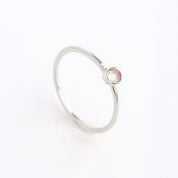 sterling silver dainty 3mm Opalite gemstone ring. October birthstone. On white background. 925 sterling silver, birthstone ring, stacking ring, stackable, birthstone jewelry, facet gemstone