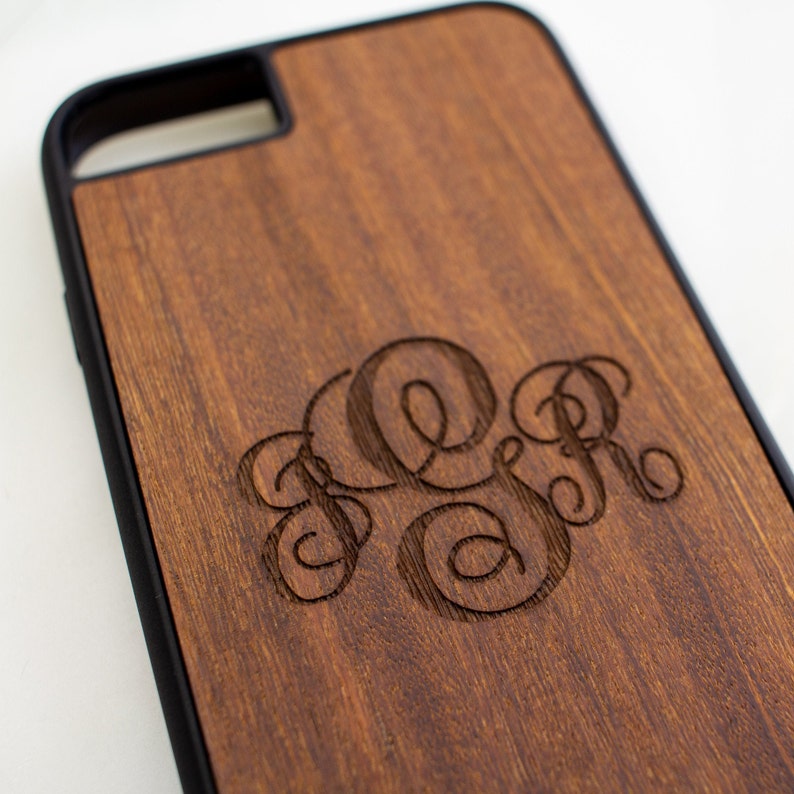 Details of our elegance monogram on the phone case. Protect your phone with our custom engraved phone case.