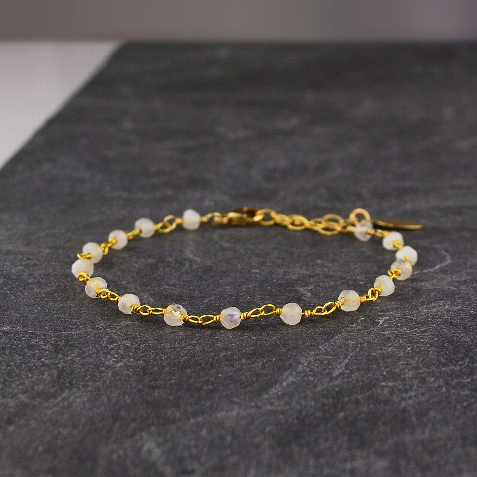 Detailed view of the gold filled wire wrapped moonstone anklet.