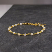 Detailed view of the gold filled wire wrapped moonstone anklet.