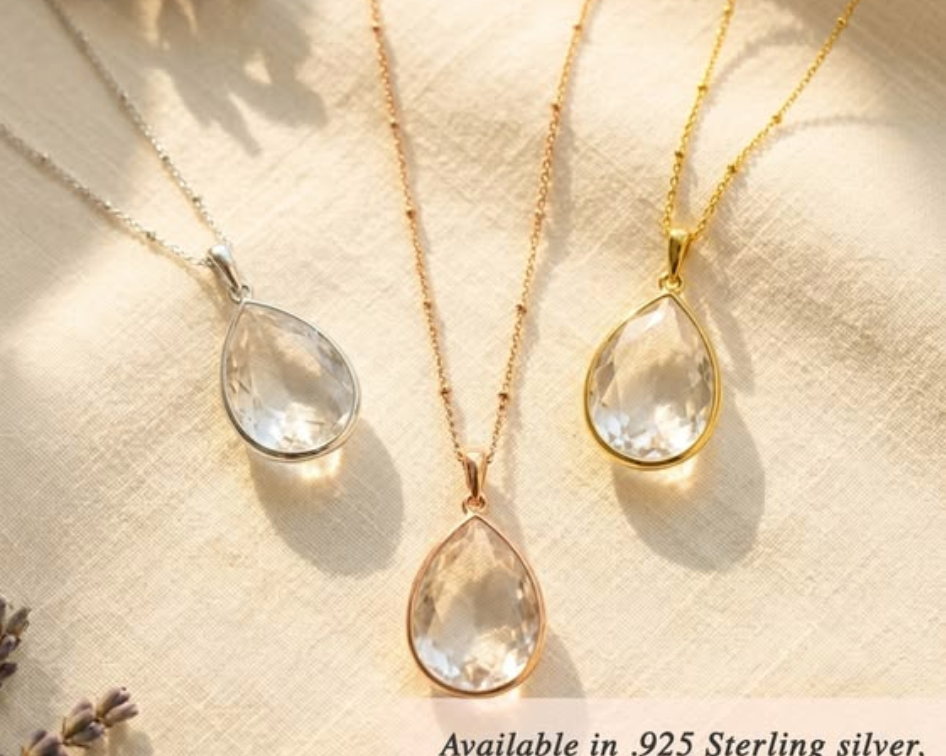 Clear quartz teardrop necklaces in gold and silver on neutral background, April birthstone jewelry, minimalist crystal pendant, elegant gift for Mother’s Day, birthday, bridal jewelry, wedding necklace