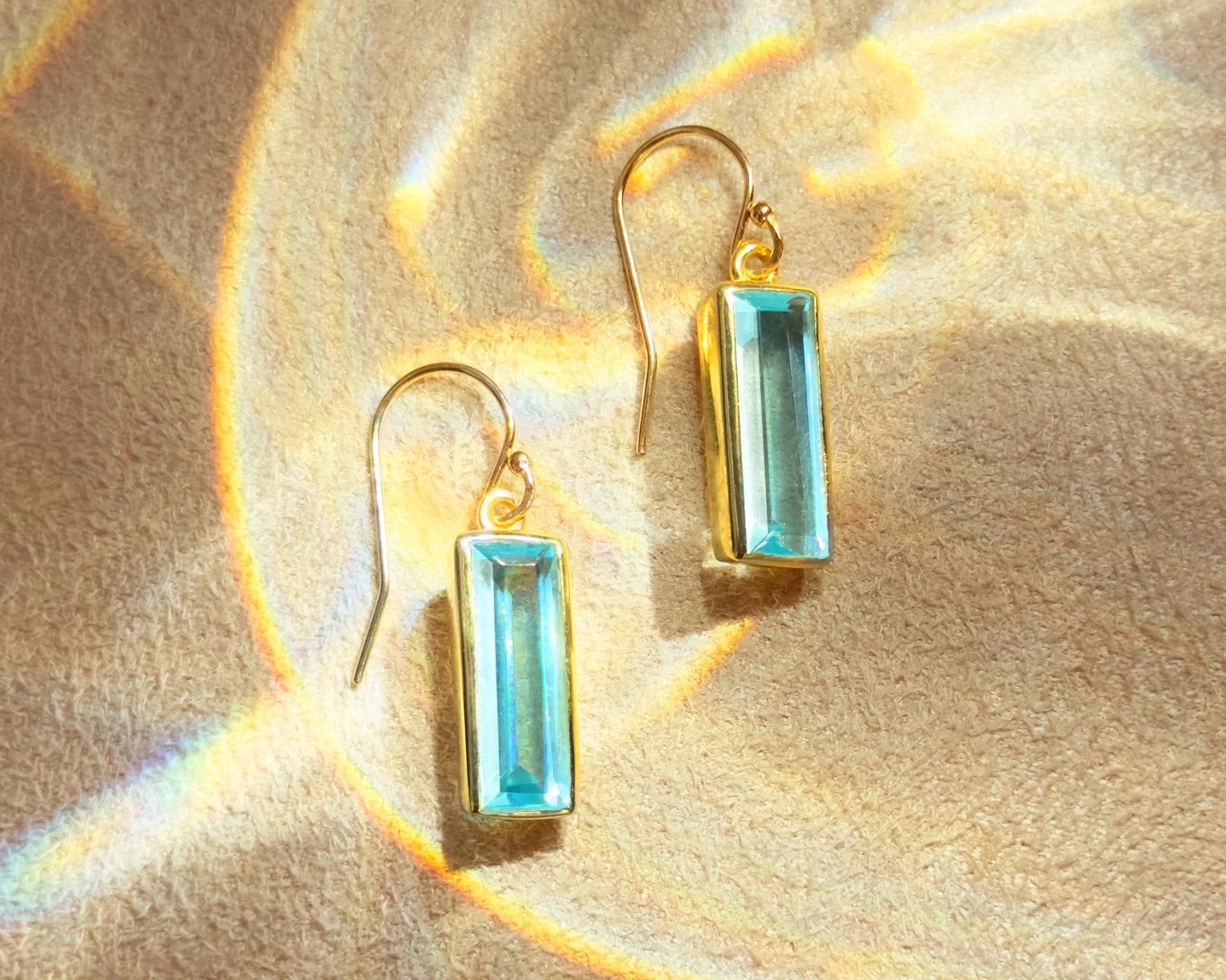 Blue Topaz December birthstone jewelry symbolizing clarity, love, and peace. Dainty blue gemstone ring or necklace in gold or silver—perfect personalized gift for her, birthday, or anniversary.