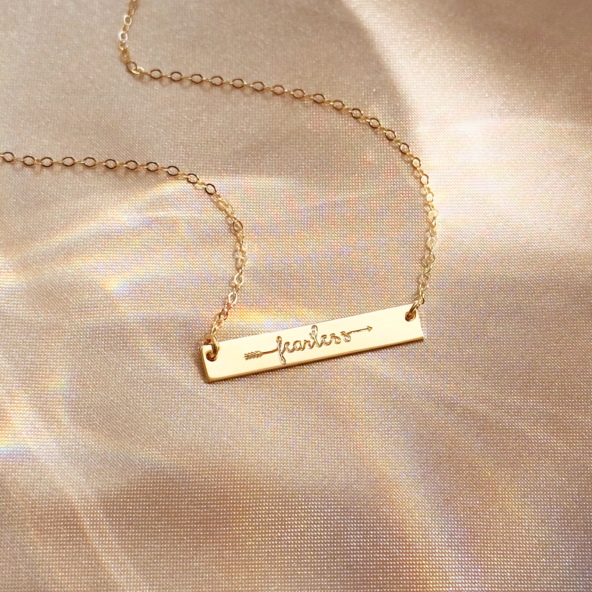 Custom plate necklace engraved with fearless, brave, or personal word. Sterling silver, yellow or rose gold-filled. Encouragement gift for back to school, new job, or moving to a new city.