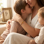 Custom mom bracelet available in sterling silver, 14K gold-filled, and 14K rose gold-filled finishes with personalized birthstone combinations.