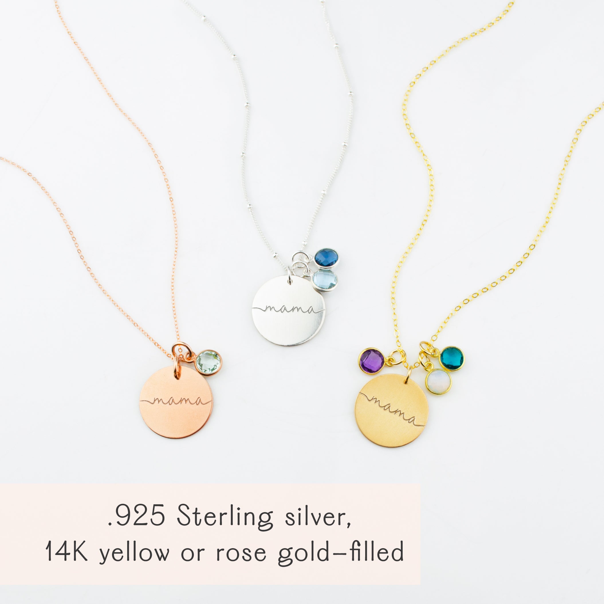 Mama 19mm disc necklaces come in rose gold filled, sterling silver or gold filled. Necklaces from left to right are a single rose gold filled mama necklace and green amethyst stone, single silver mama disc necklace with satellite chain and sky blue and kyanite stones. Third, gold filled mama disc necklace with purple amethyst, moonstone and kyanite birthstones. 