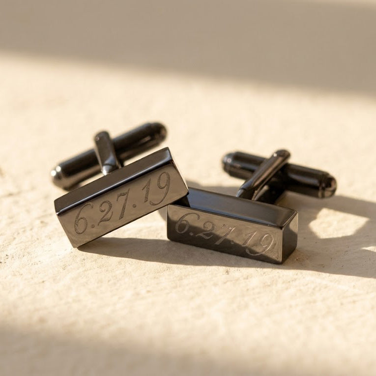 Black 3D bar cufflinks engraved with a meaningful date and custom text.
