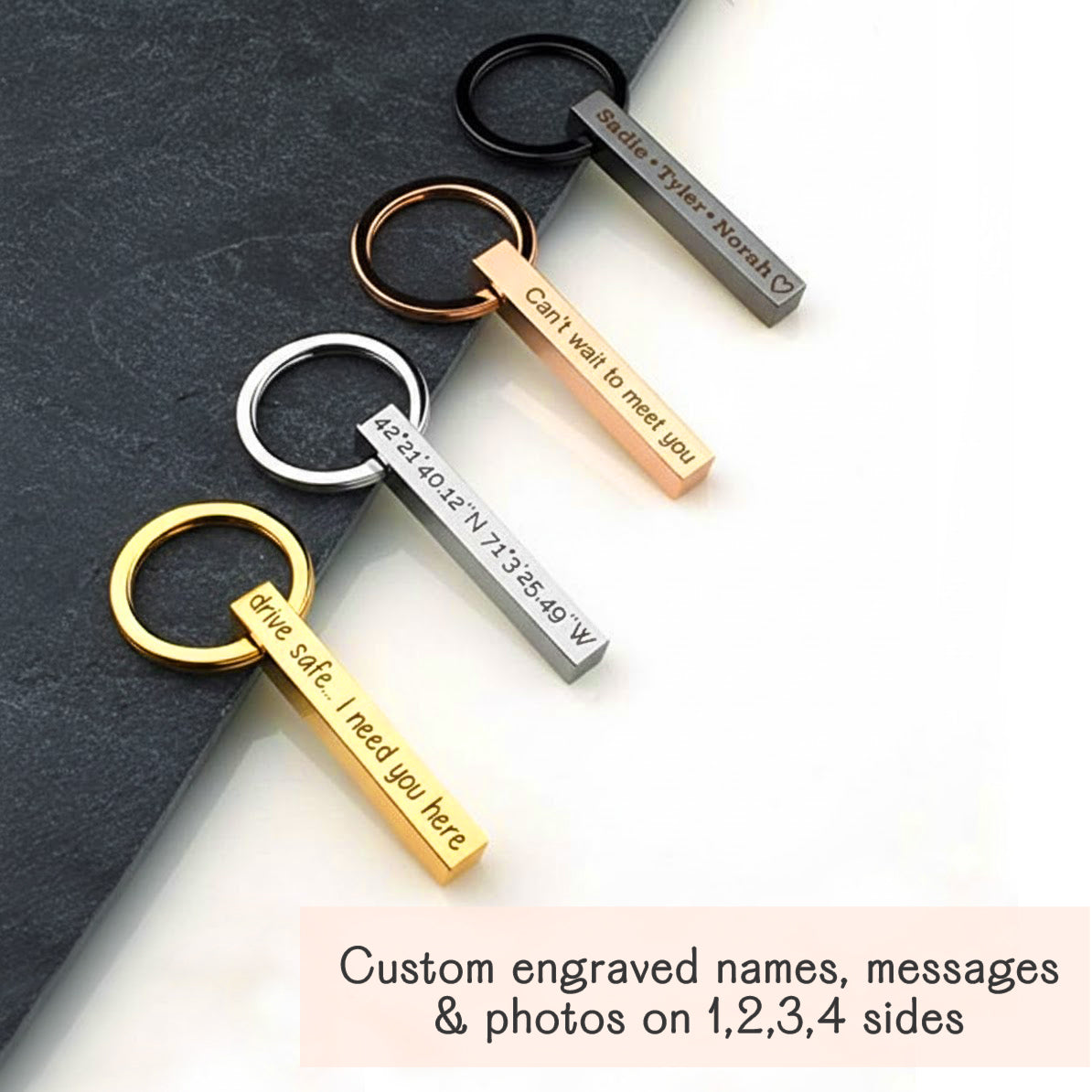 Collection of vertical bar keychains in black, silver, gold, and rose gold on a matte card, each etched with different phrases. Demonstrates color variety, deep engraving, and clean lines—ideal for monogram keyring, “drive safe I need you here” message, or matching groomsmen keychain set for weddings and bachelor party favors.