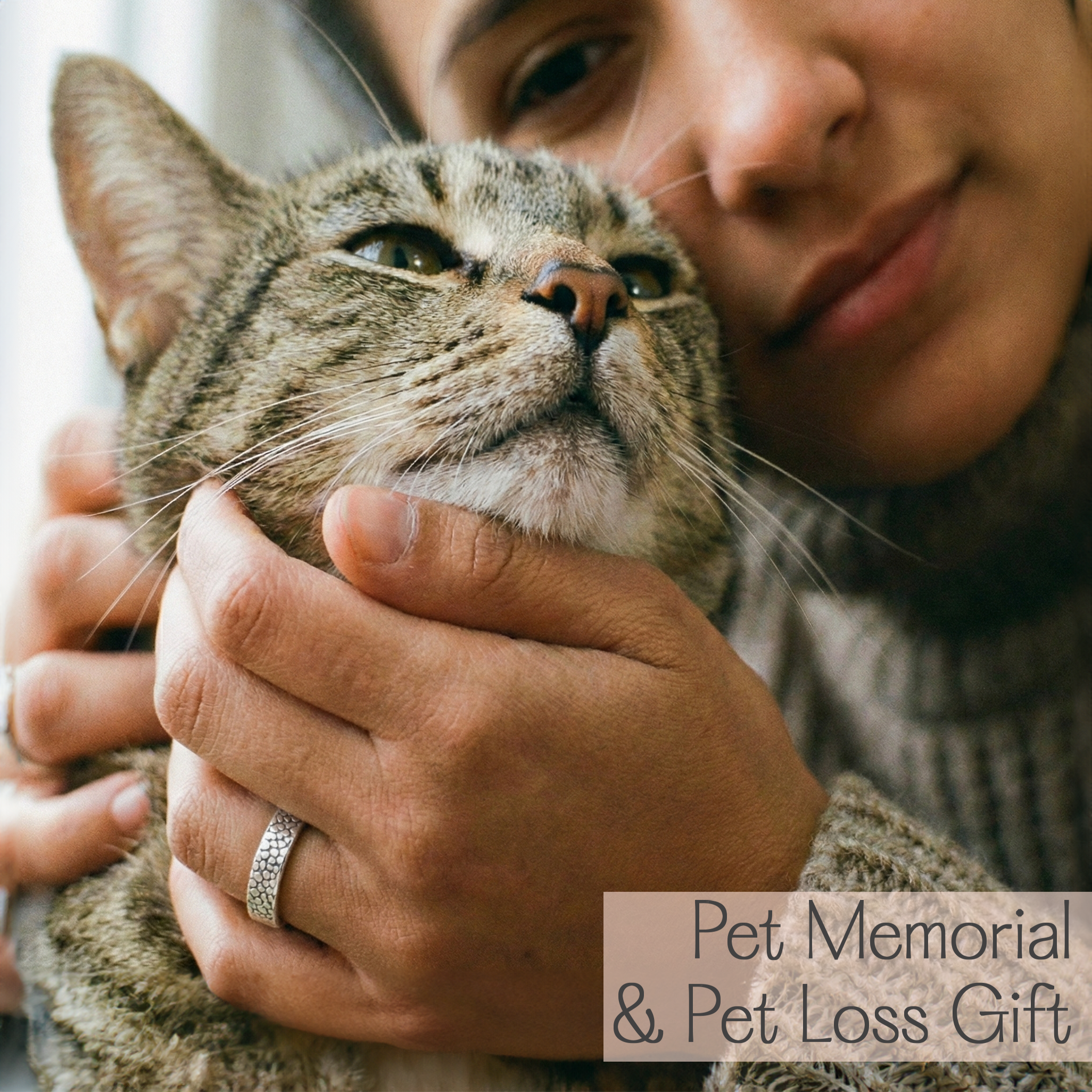 Pet memorial jewelry lifestyle photo featuring a person holding a cat to represent a custom cat nose print ring or pet print ring made from your pet’s real nose texture, a comforting remembrance keepsake for pet loss and rainbow bridge gifting, personalized with optional inside engraving for name date or a short message, polished comfort band in sterling silver or gold vermeil finishes, meaningful sympathy gift for cat moms and pet parents wanting a wearable memory.
