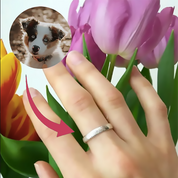 A hand wearing an engraved dog nose print ring. Dog nose print ring, engraved pet ring, custom dog jewelry, sterling silver dog ring, vermeil gold pet ring, rose gold dog ring, personalized pet ring, dog lover gift, pet keepsake jewelry, custom engraving, unique pet memorial, dog owner gift, pet jewelry