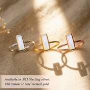 Tiny Opalite bar rings shown in sterling silver, yellow gold and rose gold finishes.

