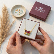 Elegant birthstone necklace for mom representing children with small gemstones, minimalist gold family necklace gift idea for her