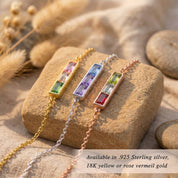Close-up of custom birthstone bar bracelets with engraved hidden initials, personalized rectangular birthstone bracelets in multiple metal finishes, dainty engraved jewelry for women, custom bracelet gift for mom, grandma, sister, or bridesmaid, minimalist birth month stone bracelet, colorful family jewelry keepsake, personalized bar bracelet for stacking or gifting