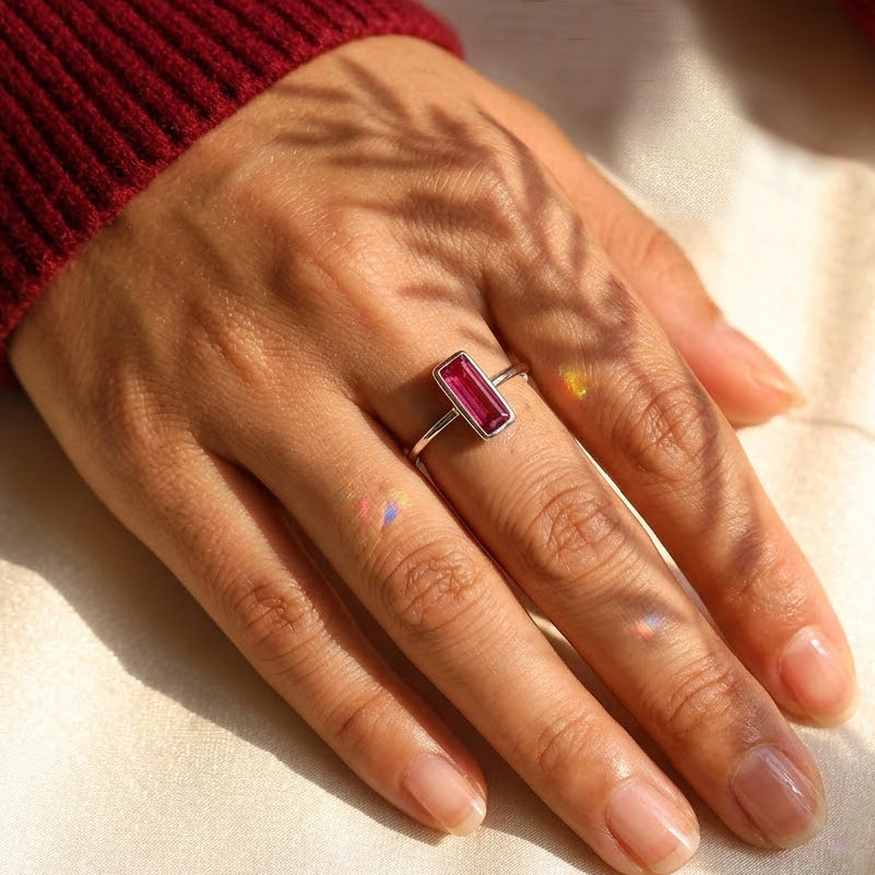 Small ruby quartz baguette ring shown with other Adira gemstone stacking rings.