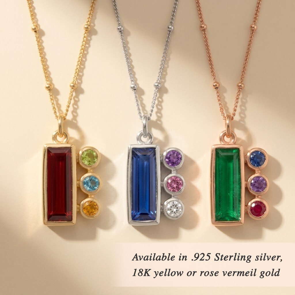 Personalized birthstone necklace for moms, shown in silver with a blue baguette mom stone and tiny kids’ gemstone charms in sterling silver or rose gold