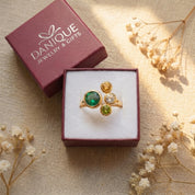 Personalized family birthstone ring displayed in Danique Jewelry signature gift-ready packaging.
