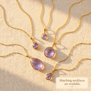 Matching alexandrite quartz earrings and necklaces arranged together for a coordinated June birthstone jewelry set