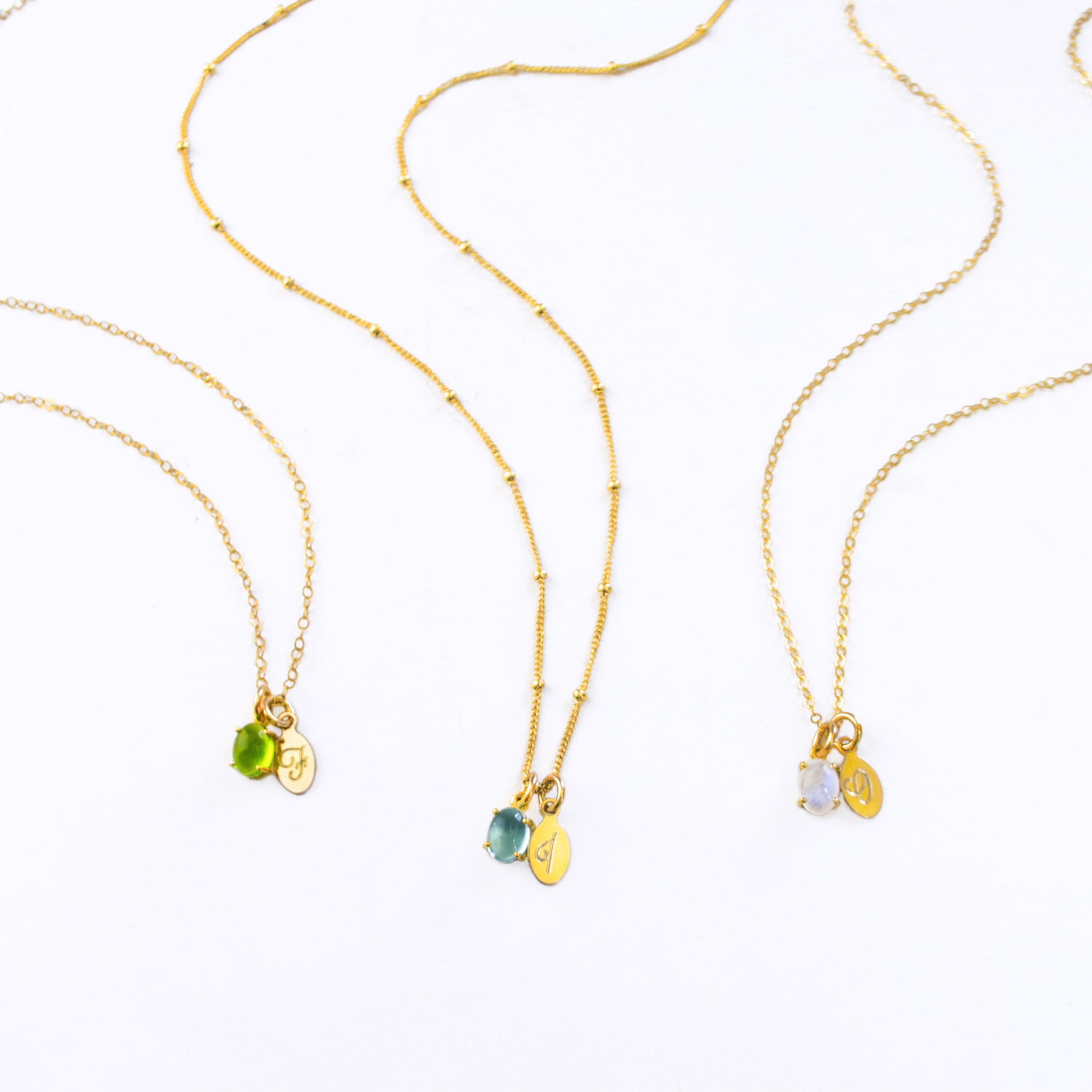 all-birthstones-oval-prong-name-necklace_69c7240c-0110-497f-8ed3-aee17a85ea83.jpg