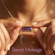 Model wearing a gold amethyst birthstone bar necklace styled on an 18 inch chain