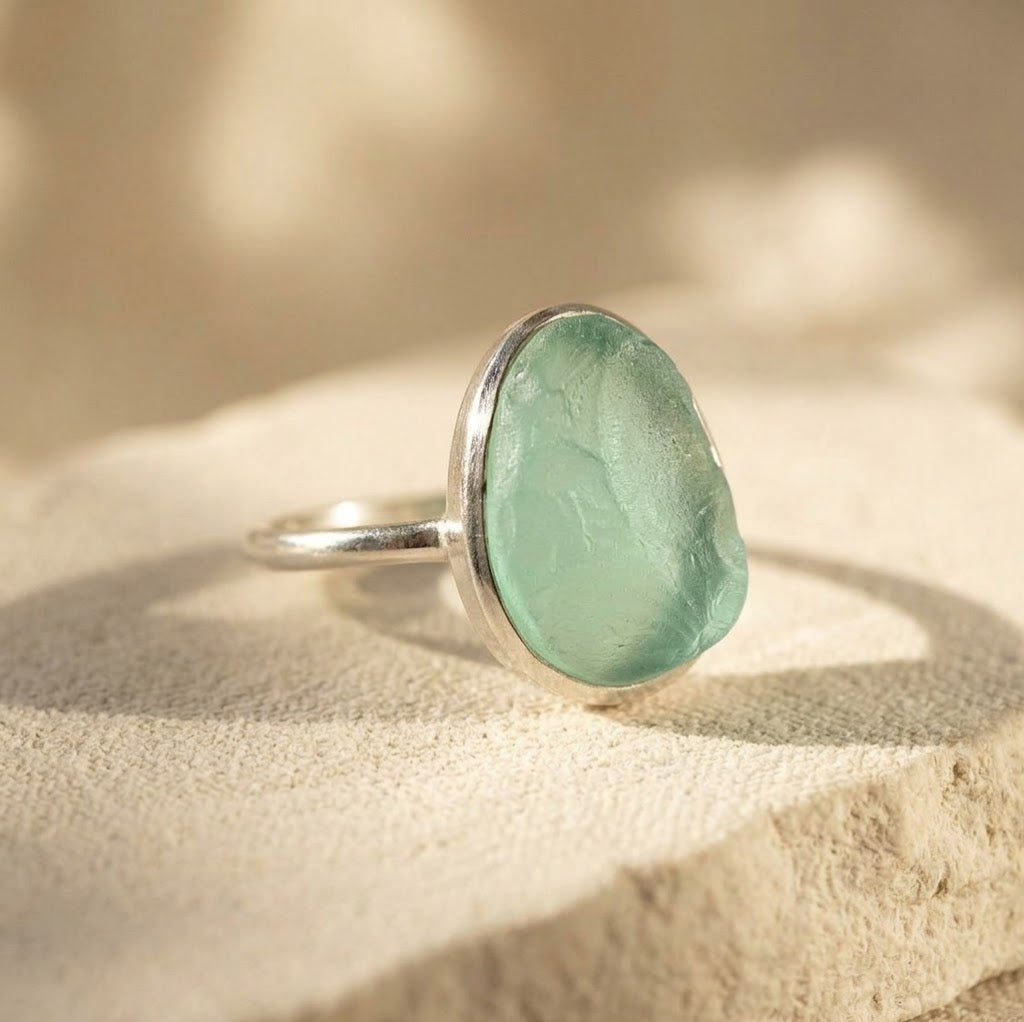 Large rough cut aqua chalcedony teardrop ring in sterling silver.
