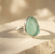 Large rough cut aqua chalcedony teardrop ring in sterling silver.
