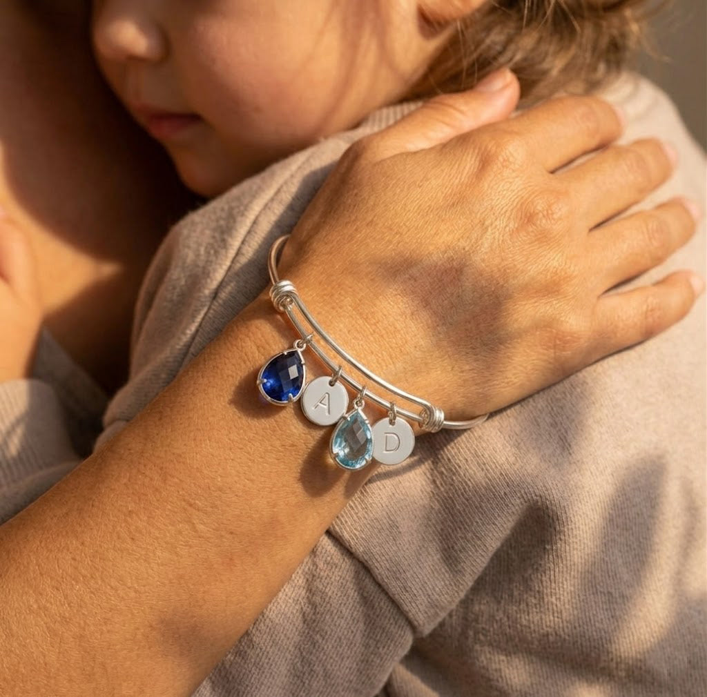 Silver custom birthstone bangle bracelet with teardrop charms and initials, personalized bracelet for mom or grandma.