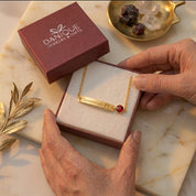 Personalized mom bracelet with child footprint engraving and gemstone charm