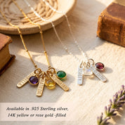 Personalized birthstone bar necklace for mom styled on neutral background, custom engraved family necklace in sterling silver and gold