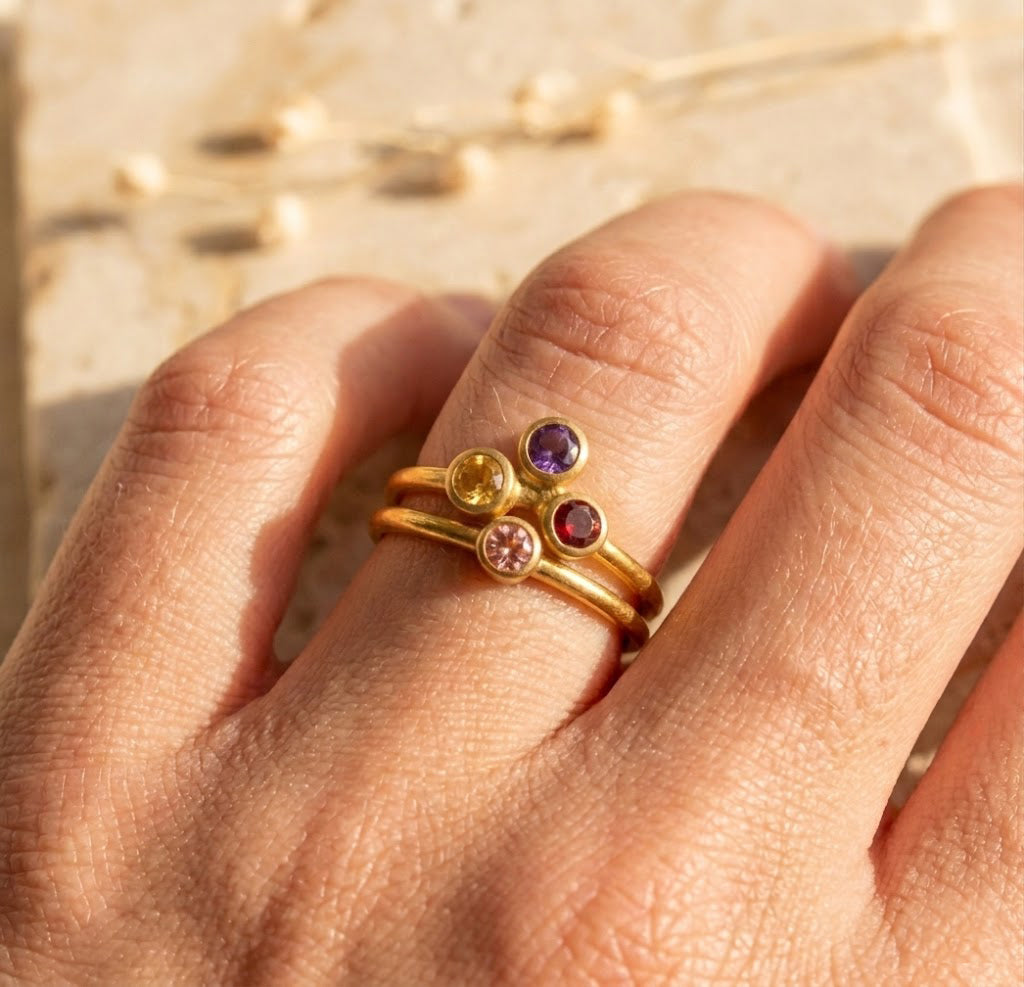 Family birthstone ring gold with colorful gemstones representing children