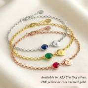 Stacked custom birthstone bracelets in sterling silver, yellow gold, and rose gold with engraved initial charms, personalized family jewelry gift for women