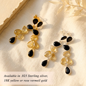 Minimalist gold earrings with raw rutilated quartz and black onyx stones
