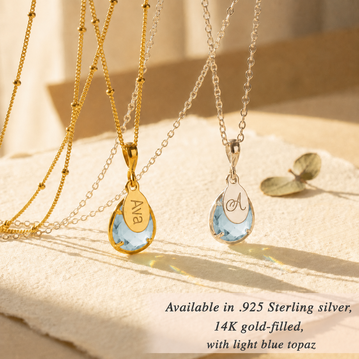 Personalized blue topaz necklaces in gold, sterling silver and rose-toned metal options