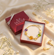 Custom birthstone bracelet for mom with engraved initial charms displayed in luxury gift box, personalized family jewelry gift for Mother’s Day or birthday
