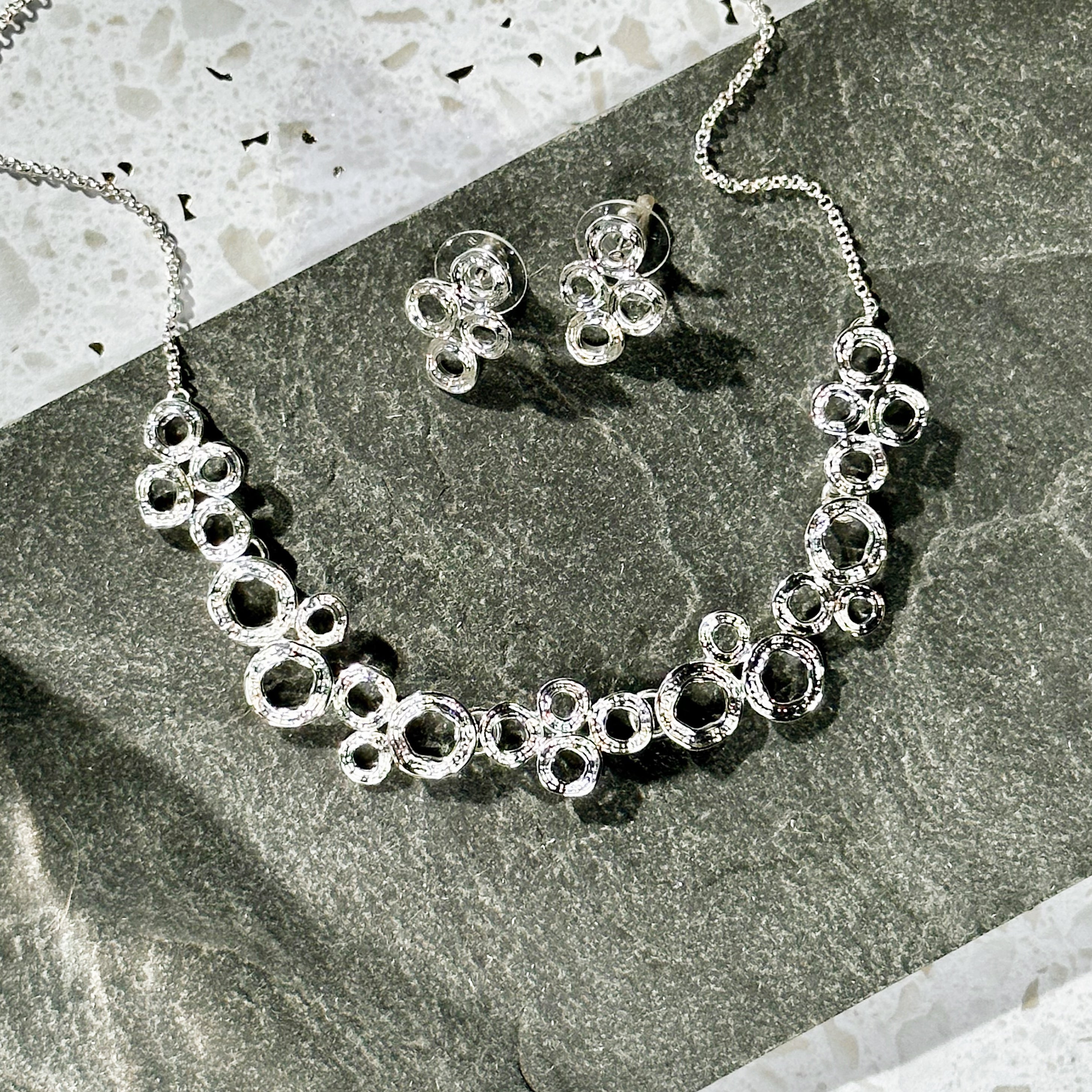 bubble-necklace-earrings-set-silver_47ee1f00-e0c8-49d1-982d-c65b5167b5a7.jpg