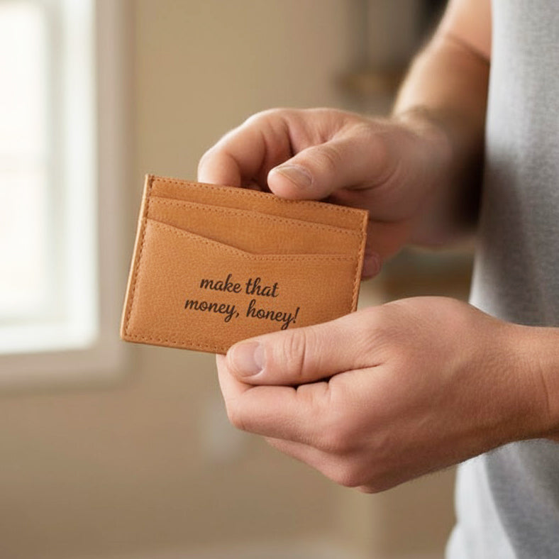 Handcrafted engraved leather card holder shown in hand, custom message wallet for men, slim personalized wallet, great gift for boyfriend, husband, Christmas or Father’s Day.