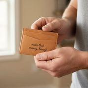 Handcrafted engraved leather card holder shown in hand, custom message wallet for men, slim personalized wallet, great gift for boyfriend, husband, Christmas or Father’s Day.