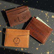 Personalized brown leather card holders featuring monogram and handwriting engraving options. These custom engraved wallets offer a slim design with multiple card slots, crafted from durable full-grain leather. A perfect gift for men, including husbands, dads, or groomsmen, this engraved wallet makes a timeless keepsake for Christmas, birthdays, or wedding party gifts. Available in espresso, honey, cinnamon, and other classic leather colors.