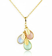 A gold birthstone necklace with engraved name tags. Stones are bezel set and placed on a cable link chain. Birthstone necklace, mother's necklace, Christmas, Mother's Day gift for mom from kids, birthstone kids necklace, new mom necklace