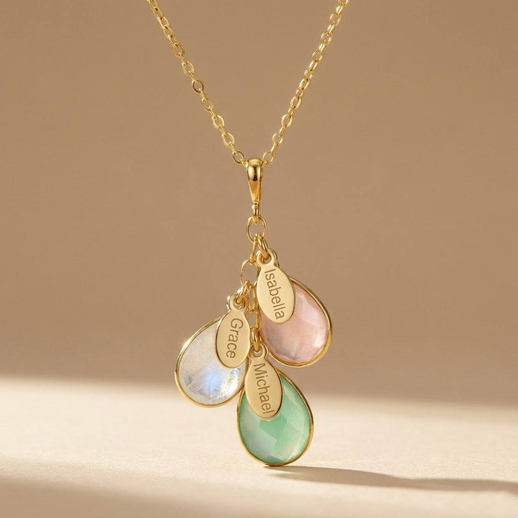 A gold birthstone necklace with engraved name tags. Stones are bezel set and placed on a cable link chain. Birthstone necklace, mother's necklace, Christmas, Mother's Day gift for mom from kids, birthstone kids necklace, new mom necklace