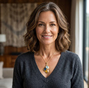 Woman wearing a personalized birthstone necklace with names, a meaningful mom necklace customized with children’s or grandchildren’s birthstones.
