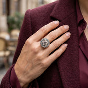 Woman wearing Constellation Orb statement ring with burgundy blazer

