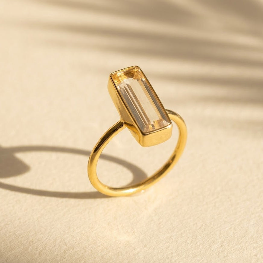 Clear quartz bar ring in gold vermeil, faceted rectangle April birthstone stacking ring
