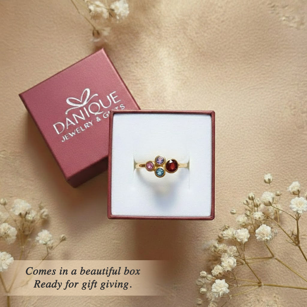 Personalized birthstone mom ring presented in Danique Jewelry gift box, ready-to-gift family birthstone jewelry for mothers and grandmas, custom mother ring with children’s birthstones, meaningful keepsake gift for Mother’s Day, birthday, or new mom, handcrafted minimalist birthstone ring inspired by April diamond quartz and October opal, elegant family jewelry packaging